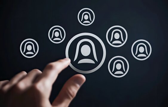 A hand touches a highlighted female icon among others on a dark background