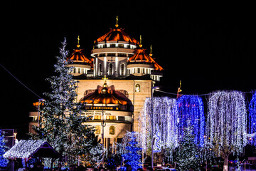 Fototapeta premium Christmas Lights and Orthodox Cathedral at Night in Romania