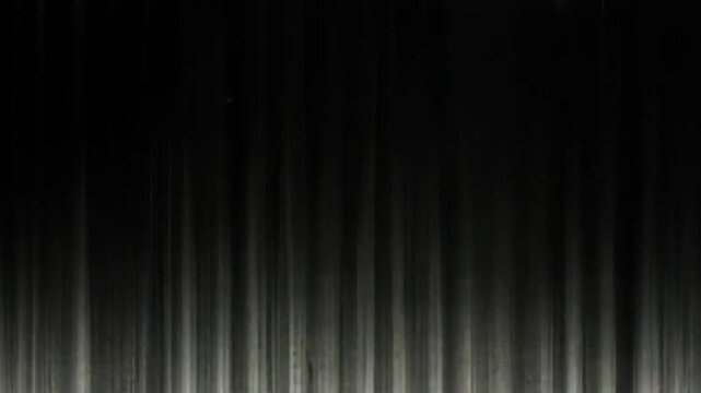 Abstract grunge art with black paint drips and gray texture background, great for textures, graphic design and wallpapers.