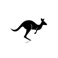 Fototapeta premium Silhouette of a kangaroo in mid leap with a long tail and pointy ears in a side profile view, isolated