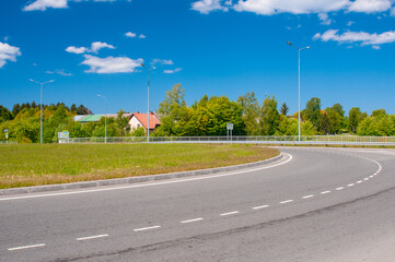 Empty curve roadway in country in summer