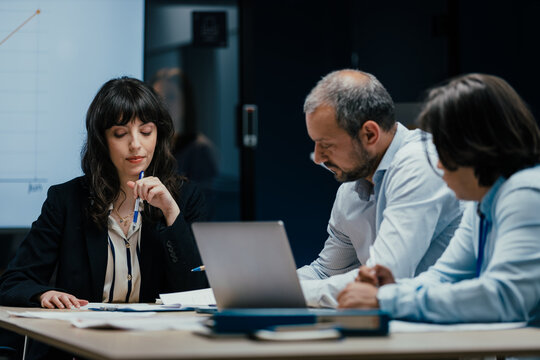 VC Fund board members brainstorming and discussing startup investment results in business meeting