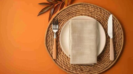Elegant Place Card Displayed on a Folded Napkin Surrounded by Luxurious Gold Cutlery and Tropical Elements for a Stunning Table Setting