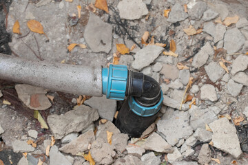 Plastic pipe for water supply from hole.Pumping water into the house.