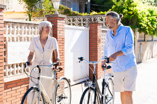 Beautiful happy senior couple dating at the seaside during summertime