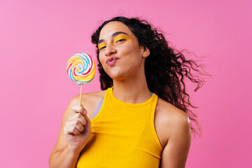 Creative studio portrait of beautiful hispanic woman with diastema