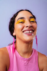 Creative studio portrait of beautiful hispanic woman with diastema