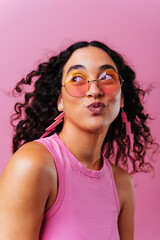 Creative studio portrait of beautiful hispanic woman with diastema
