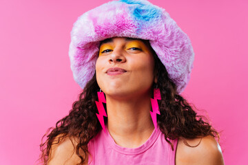 Creative studio portrait of beautiful hispanic woman with diastema