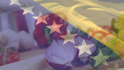 Bosnia Herzegovina flag sweeping over vegetables and steel pot while oil swirling for cooking prep - Powered by Adobe