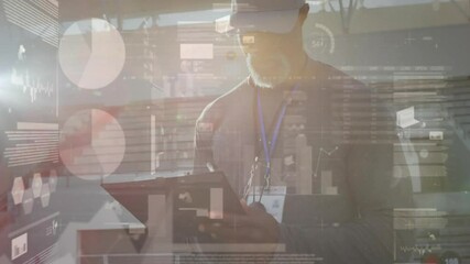 Mature male tapping tablet and swiping dashboards in stadium analyzing metrics with animated charts - Powered by Adobe