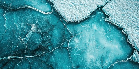 Frozen surface with diagonal crack detail and teal background contrast