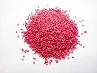 plastic masterbatch, oncolor red polymer masterbatch type cold cutting raw material granular, isolated on white background, for product catalog design of plastic manufacturing industry company profile