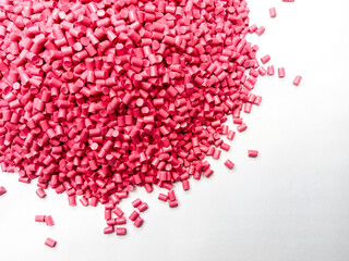 plastic masterbatch, oncolor red polymer masterbatch type cold cutting raw material granular, isolated on white background, for product catalog design of plastic manufacturing industry company profile