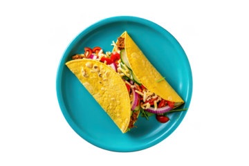 Two yellow corn tacos filled with shredded meat cheese lettuce tomato onion and cucumber on a blue plate