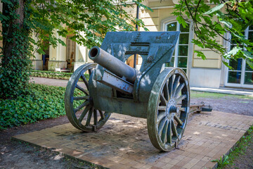 Cannon in a Park. Old Artillery weapon gun mortar howitzer.