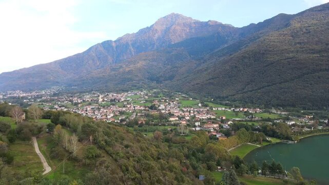 Aerial nature landscape of Colico village in Lake Como Italian Alps during fall in Lombardy