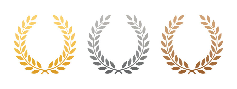Gold silver and bronze laurel wreaths representing first second and third place awards and achievements