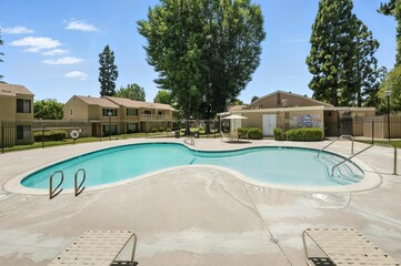 Remodeled Condo with Community Pool, Modern Kitchen, and Light-Filled Open Interiors