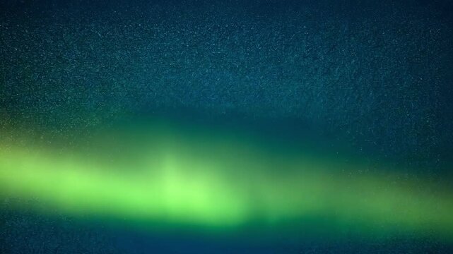 Abstract gradient background with blue and green colors, textured surface.