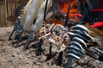 Assorted Seafood Espetos Grilling Over Fire