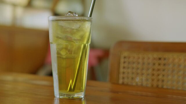 Refreshing Iced Green Tea in a Cozy Cafe