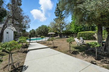 Private Ranch-Style Home with Pool, Mature Landscaping, and Modern Light Interiors