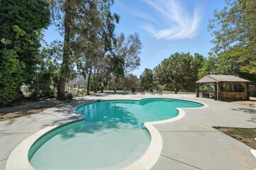Private Ranch-Style Home with Pool, Mature Landscaping, and Modern Light Interiors