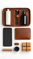 Flat Lay of Men's Travel Grooming Kit with Smartphone and Leather Accents