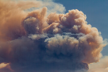 Intense orange smoke from a forest fire. The image is from the Holy Fire in August 2018