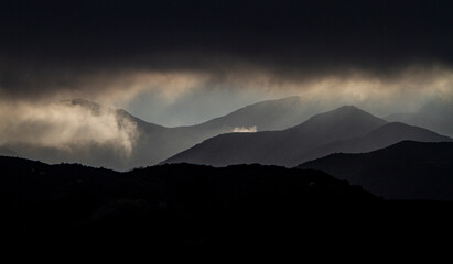 Silhouette of mountains after a storm