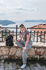 ourney, young woman embarks solo journey, middle breathtaking mountain panorama. Embracing self-care digital nomad lifestyle, freedom, adventure and personal growth
