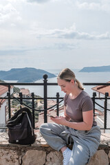 ourney, young woman embarks solo journey, middle breathtaking mountain panorama. Embracing self-care digital nomad lifestyle, freedom, adventure and personal growth