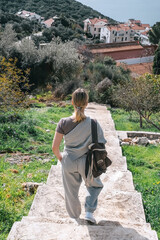 ourney, young woman embarks solo journey, middle breathtaking mountain panorama. Embracing self-care digital nomad lifestyle, freedom, adventure and personal growth