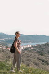 ourney, young woman embarks solo journey, middle breathtaking mountain panorama. Embracing self-care digital nomad lifestyle, freedom, adventure and personal growth