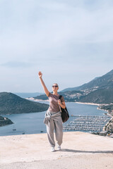 ourney, young woman embarks solo journey, middle breathtaking mountain panorama. Embracing self-care digital nomad lifestyle, freedom, adventure and personal growth