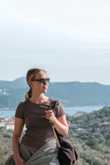 ourney, young woman embarks solo journey, middle breathtaking mountain panorama. Embracing self-care digital nomad lifestyle, freedom, adventure and personal growth