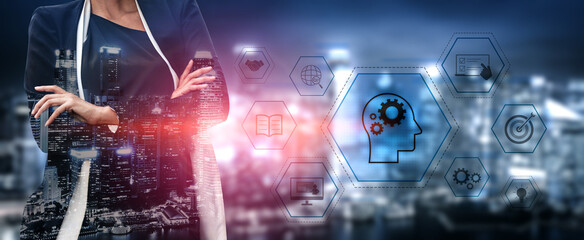 Head with gear and icons representing learning, digital training, and development process, showing...