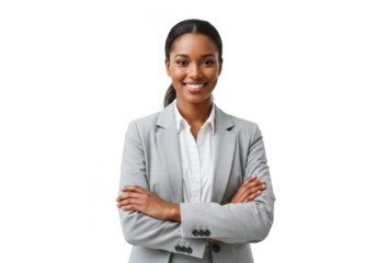A smiling businesswoman with arms crossed stands confidently isolated on transparent background