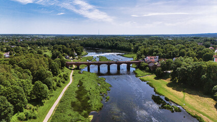 Scenic Drone View of Kuldīga, Latvia - Historic Bridge Over the Venta River in Summer