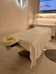 Cozy Spa Room with Massage Table and Soft Lighting