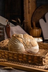 Healthy, organic, whole and sliced ​​homemade sourdough bread with ham and cheese on a wooden...