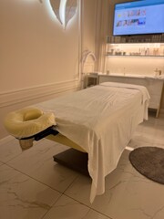 Cozy Spa Room with Massage Table and Soft Lighting