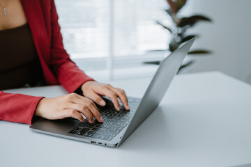 Crop shot of woman hand works on laptop Bookkeeper or financial inspector hands with copy space...