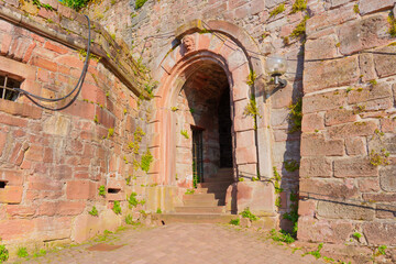 Historic Archway Entrance Surrounded By Stone Walls In Heidelberg