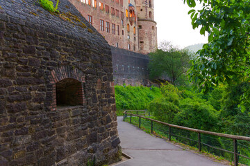 Historic Heidelberg Castle Surrounded By Vibrant Greenery At Dusk