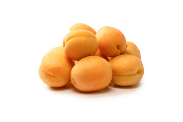Ripe juicy orange apricots isolated on white background.