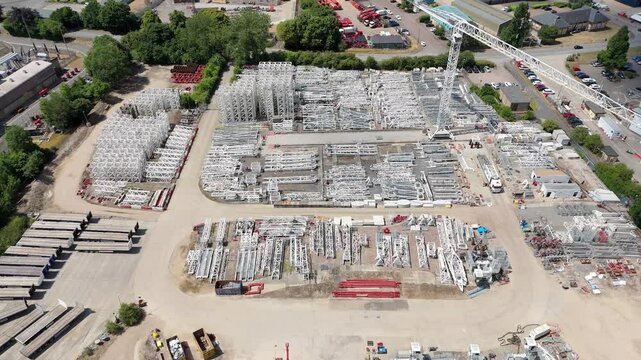 Aerial view of a crane tower construction site metal rigging building industry in Biggleswade England UK