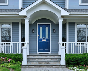 Front porch of traditional clapboard house