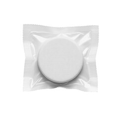White Round Pill in Foil Packaging